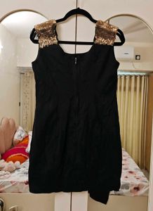 Chic Black Dress with Sequined Shoulders