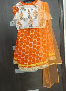 Pretty White And Orange Coloured Lehenga