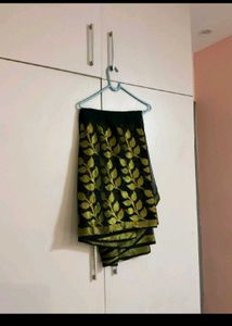 Elegant Black Saree with Golden Leaf Print