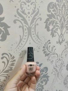 Plum Nail Polish In Colour Peaches N Cream