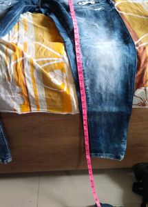 Distressed Blue Wash Denim Jeans