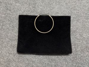 Chic Black Velvet Clutch with Gold Ring Handle