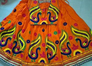Vibrant Orange Peacock Lehenga Choli