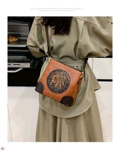 Embossed Elephant Bucket SlinG/Bag