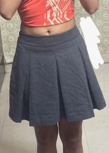 grey pleated mini skirt