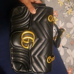Chic Black Quilted Handbag with Gold Hardware