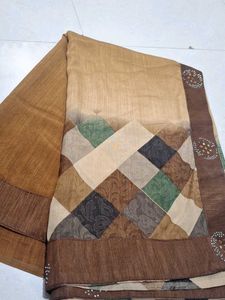 Elegant Brown Saree with Unique Print