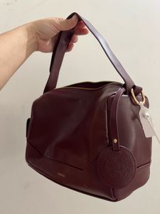 Theatre Burgundy Satchel Bag.