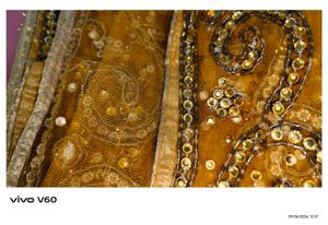 Stunning Yellow Embroidered Kundan Saree