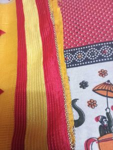 Vibrant Yellow Saree with Red Border