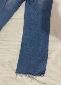 Distressed Blue Denim Jeans