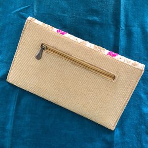 Embellished Peacock 🦚 clutch in jute finish..