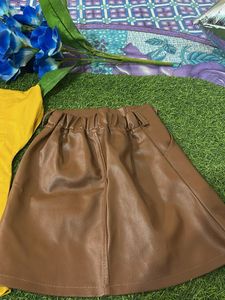 Cute Yellow Gucci Top and Brown leather skirt Set