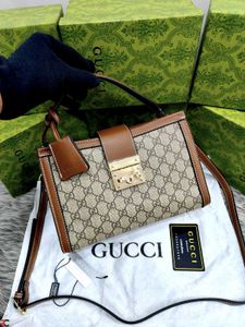 GUCCI* *PADLOCK BAG FEATURING THE ICONIC GG