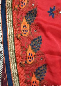 Vibrant Red Embroidered Peacock Saree