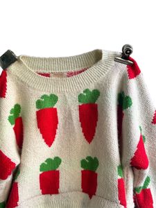 carrot sweater with maybelline lipstick