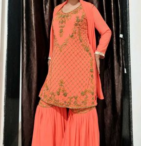 Exquisite Peach Embellished Sharara Set