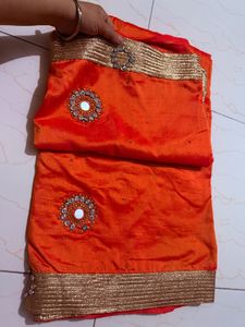 Vibrant Orange Saree with Embellishments