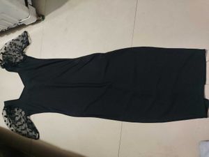 Elegant Black Dress with Sheer Sleeves