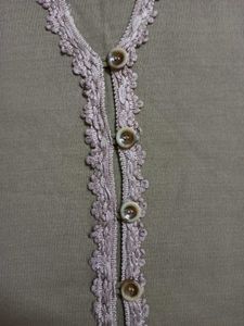 Sleeveless Sweater With Delicate Lace Trim