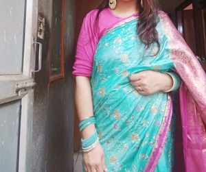 Elegant Turquoise Saree with Pink Border