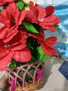 An Artificial Flower Basket For Room Decor