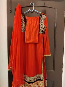 Elegant Orange &amp; Black Embroidered Salwar Kameez