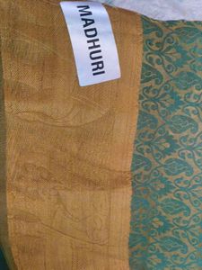 Elegant Teal Saree with Gold Border