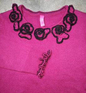 Pink Knit Sweater with Black Embellishments