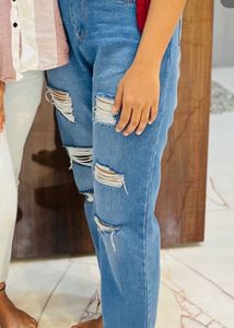 Distressed Blue Denim Jeans