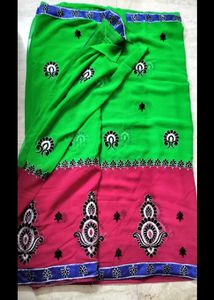 Elegant Green & Rani Pink Embroidered Saree 🌸