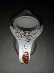 Vintage Gravy Boat with Ornate Design
