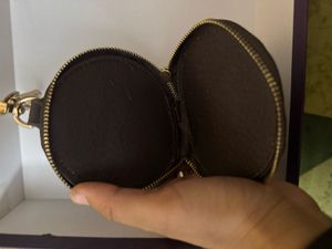 replica LV coin pouch+ labubu keychain