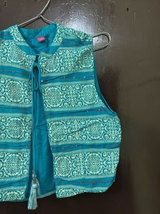 Ferozi blue jacketed kurta with beautiful print