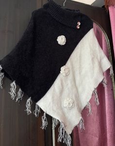Chic Black & White Poncho Sweater