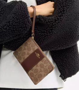 authentic Coach Signature Print Wristlet