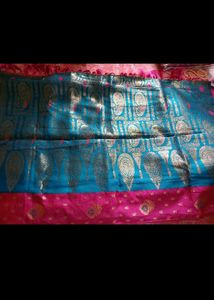Elegant Teal Saree with Gold &amp; Pink Motifs