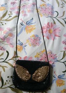 Sparkly Black Clutch with Gold Bow