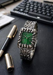 Silver Tone Watch with Intricate Design