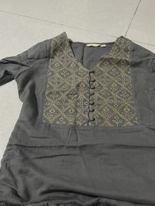 Elegant Grey Kurta with Intricate Gold Embroidery