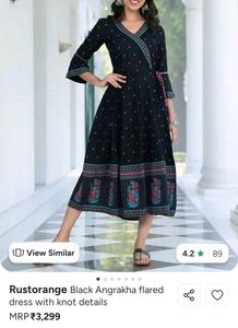 Elegant Black Dress with Pink Polka Dots