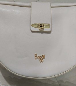 Baggit half moon sling bag