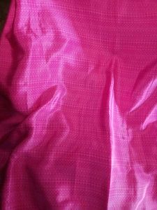 Vibrant Pink Saree with Intricate Pattern