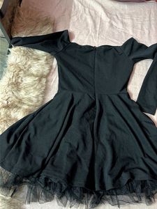 Chic Black Off-Shoulder Dress with Tulle Hem