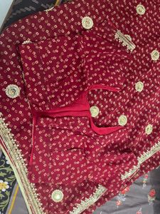 Elegant Maroon Saree with Gold Embroidery