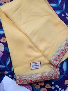 Elegant Yellow Saree with Border