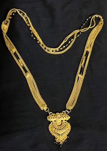 Elegant Gold mangal sutra with Black Beads