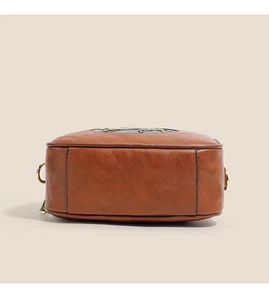 Vintage Pegasus Embossed Handbag