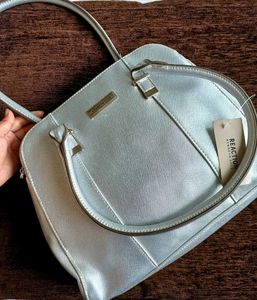 Kenneth Cole Silver Textured Hand Bag