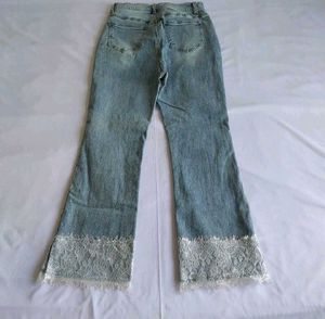 Light Wash Flare Jeans with Lace Trim